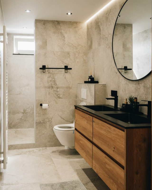 a bathroom with a large mirror