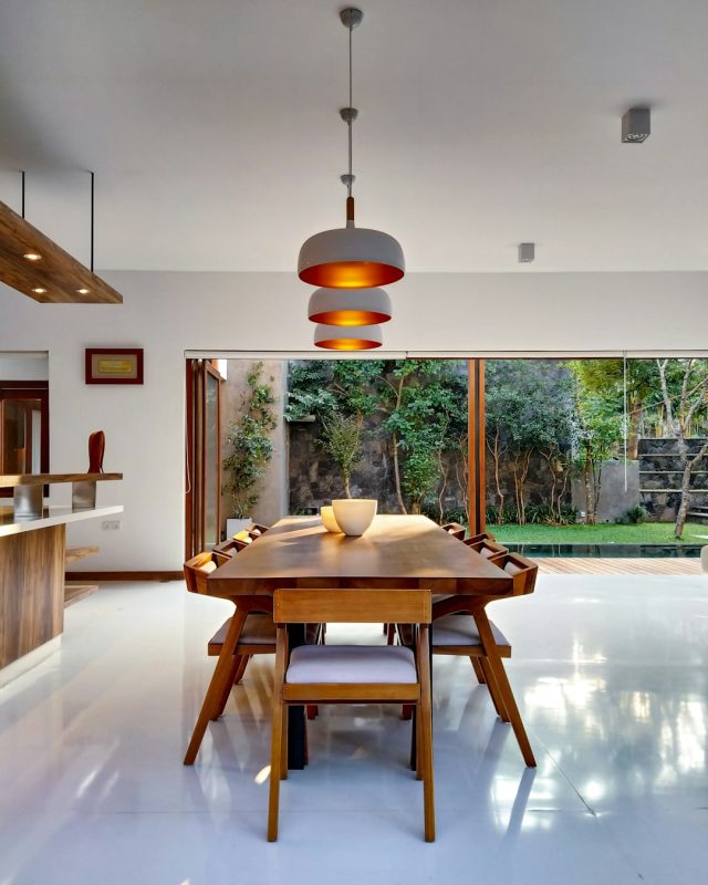 brown wooden table and chairs